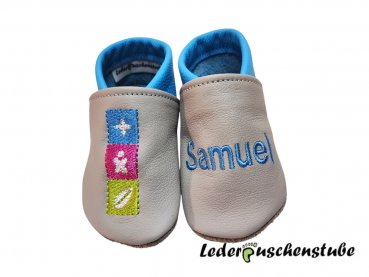 Lederpuschen grau-lichtblau, Namen links lichtblau und Logo Lippe Reha